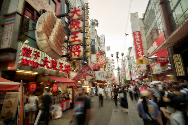 An illuminated food street in Namba, Osaka
